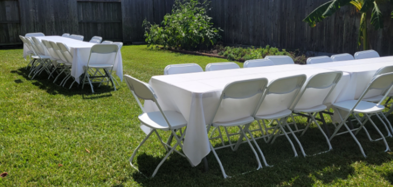tables and chairs w tablecloths backyard Home